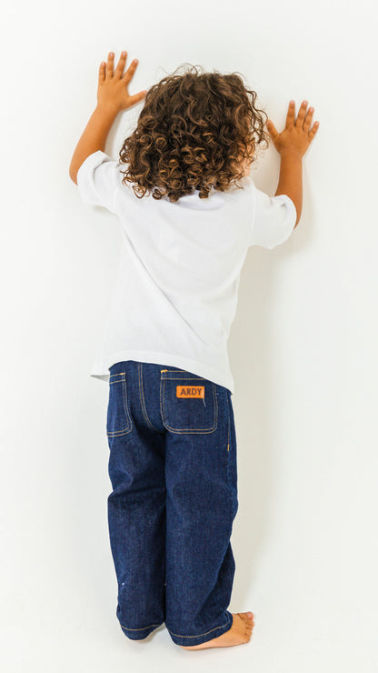 close up of blue denim pants during play, soft cotton everyday kidswear